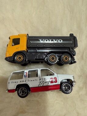 Volvo Dump Truck and Michael Jordan Tahoe